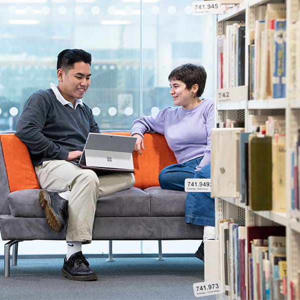 Two students sat in Bower Ashton Library