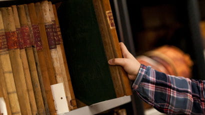 Student choosing book
