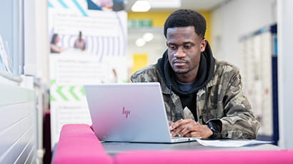 Student working on a laptop