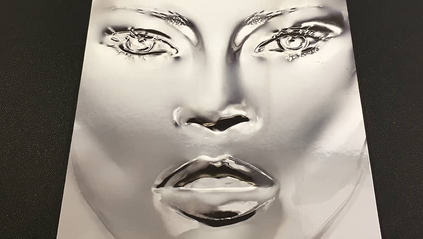 Metallic female face.