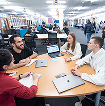 Students working in a group setting on level 4, Frenchay Library