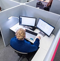 Student working in silent study booth at Frenchay Library level 5