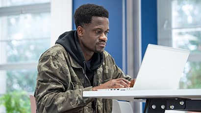 Student working on a laptop