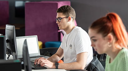 Students working in the library