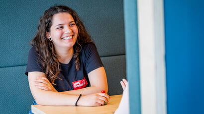 Student Career Coach wearing a UWE Bristol t-shirt and smiling.