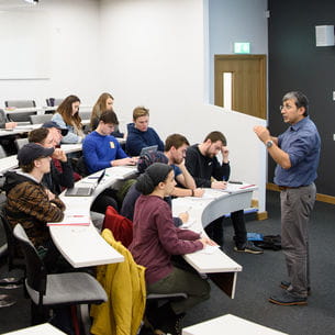 Group of students in a lecture theatre.