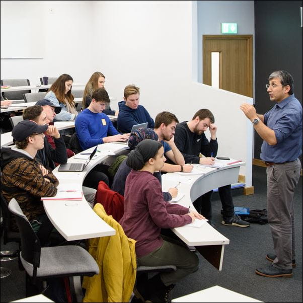 Group of students in a lecture theatre.