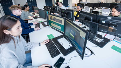 Students working on desktop computers