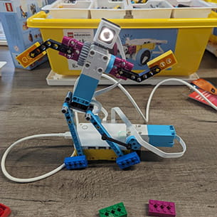 A programmable robot dancing, made out of Lego bricks.