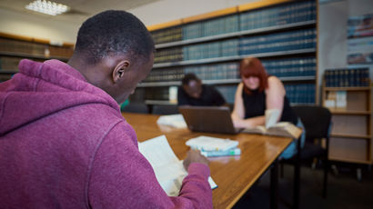 Students studying at the law library resource room at Frenchay campus.