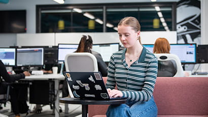 Student working on a laptop