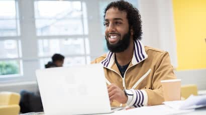Student working on a laptop