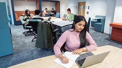 Student working on a laptop