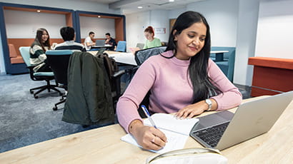 Student working on a laptop