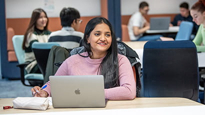 Student working on a laptop