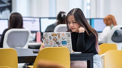 Student working on a laptop