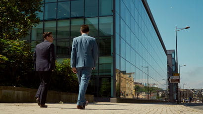 placement students walking towards office building