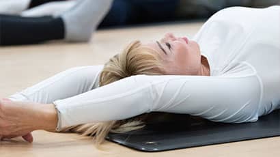A woman relaxing on the floor