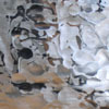 Detail of an unfinished silver wine cooler showing beaten surface