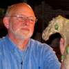 Jim Robison looking at a Tang Horse (618-907AD)