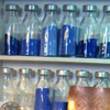 Interior of Wendy Ramshaw's workshop, showing the enamel kiln and enamels in bottles.