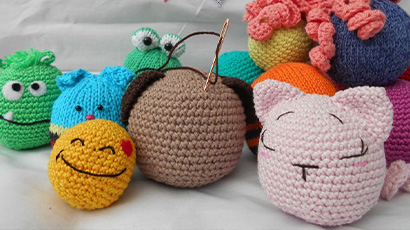 An assortment of colourful crochet creatures.