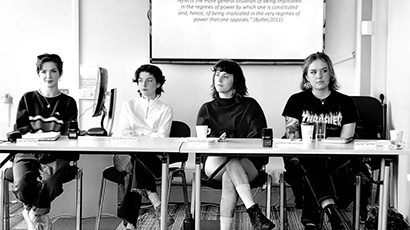 Group of arts students on a panel discussion at the Visual Encounters Symposium.