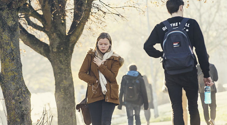 Students walking outside on a winter day