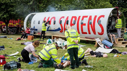 A scenario of a commercial airliner disaster and students practicing their medical skills